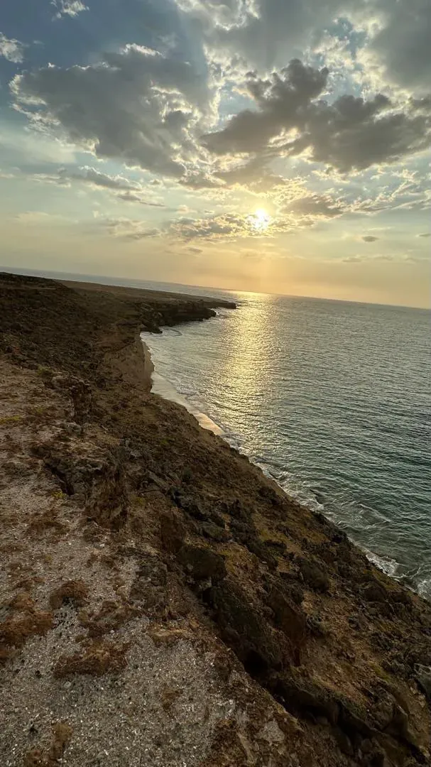 Sundown over the Atlantic from the Baía das Pipas cliffs