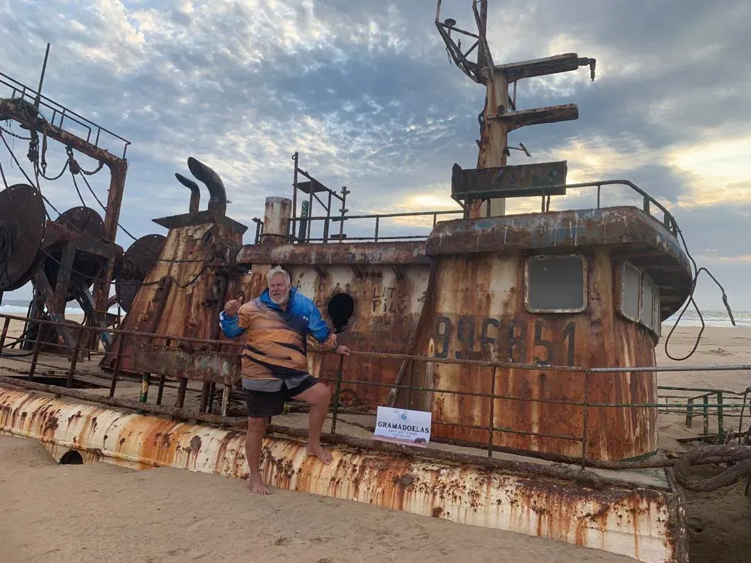 The rusting hull of the Vanessa Seafood wreck on the Angolan shore