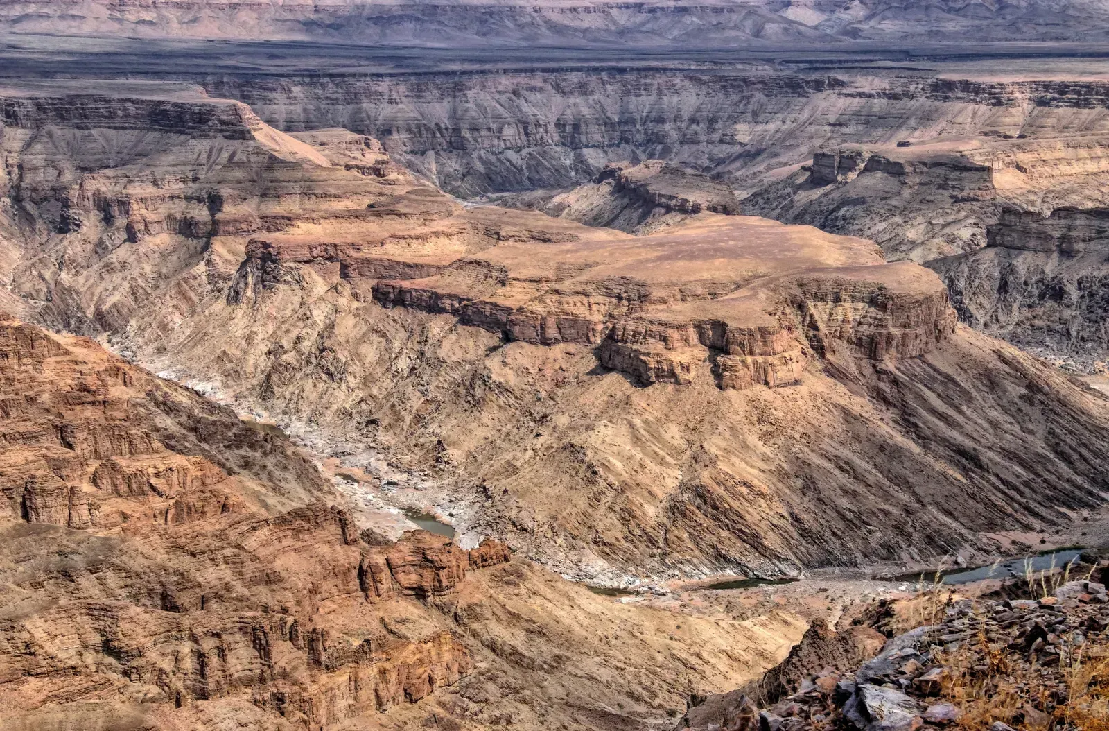 The Fish River threads past a flat-topped plateau deep in the gorge