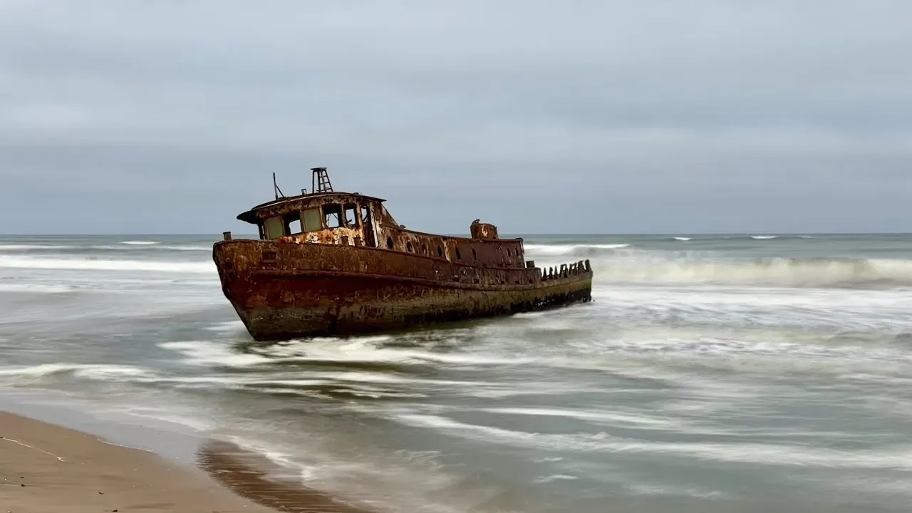 The Shawnee wreck listing in the breakers on the Namib coast