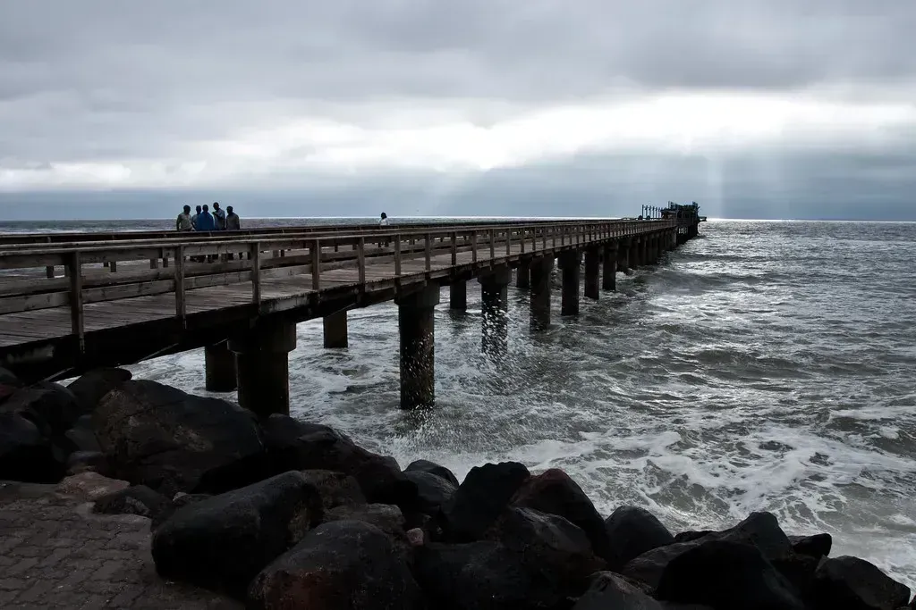 Walking the historic Swakopmund Jetty under an Atlantic sky